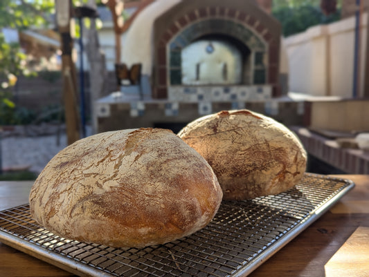 Freshly baked artisan bread in a traditional brick oven at Sherwood Coffee 'n' Bread, Albuquerque.