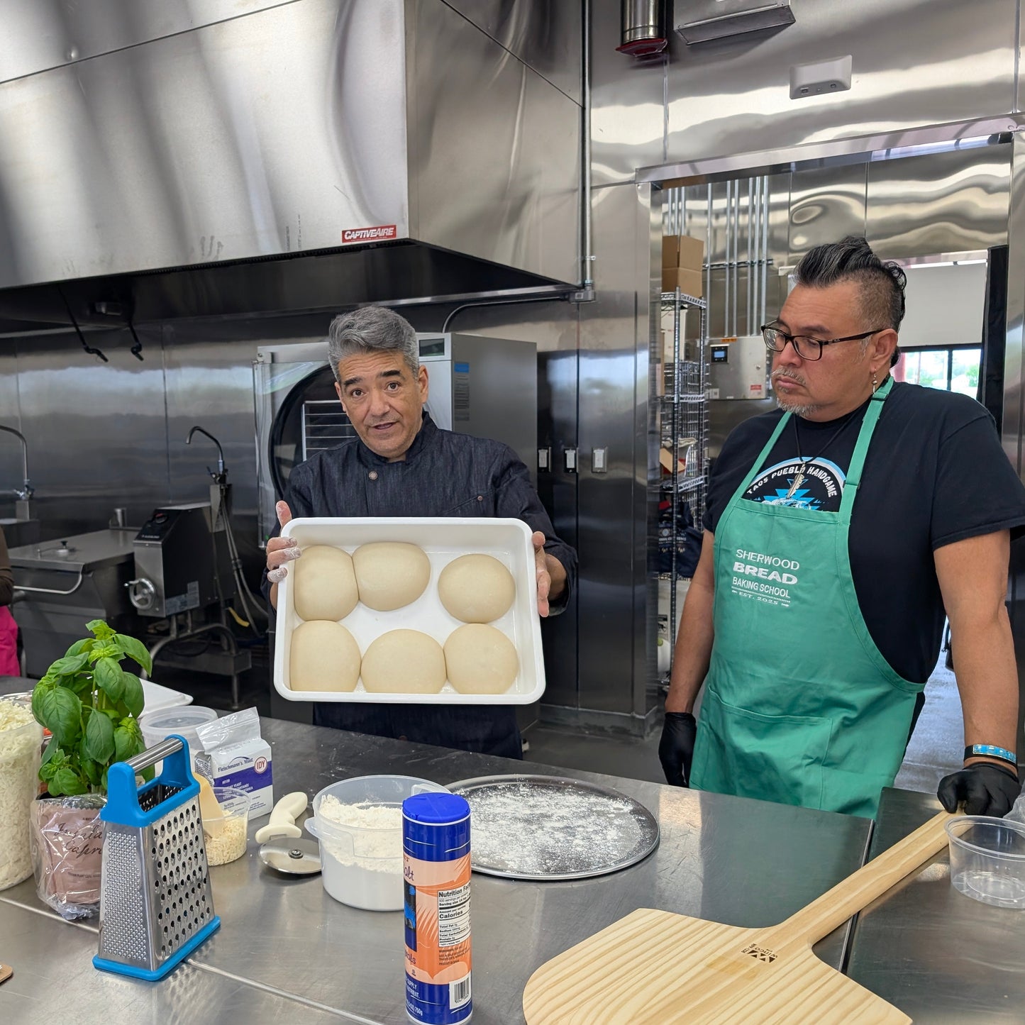 Making homemade pizza during a cooking class in Albuquerque