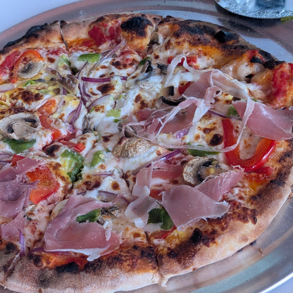 Freshly made pizza during an Albuquerque pizza making class